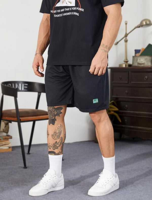 Men’s extended size letter patched drawstring shorts