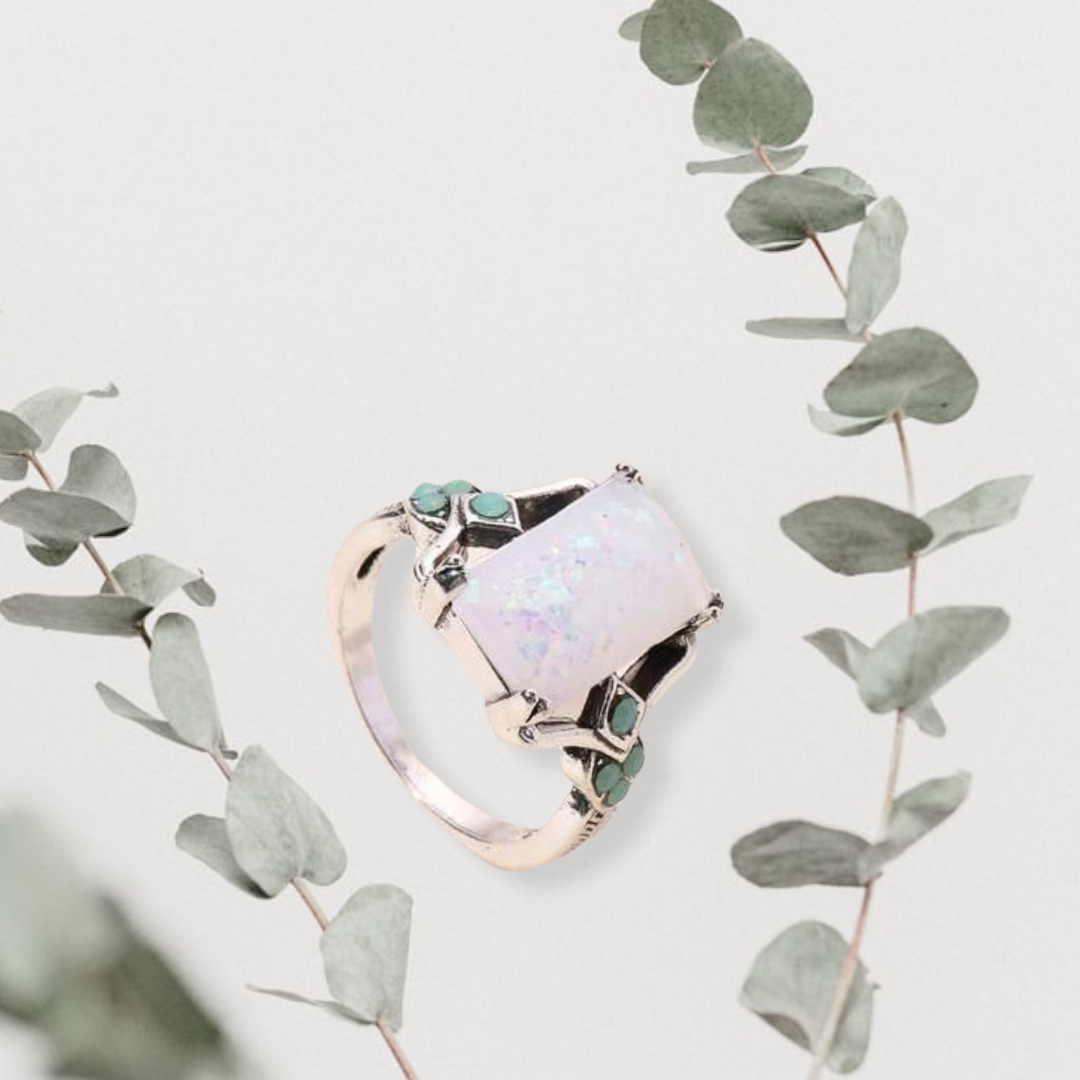 Opal inspired with turquoise accents geometric decor ring.