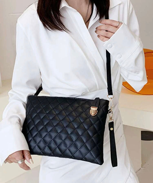 Quilted embossed zip crossbody bag
