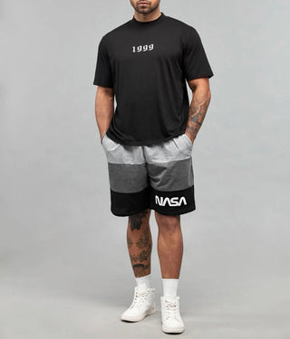 Men’s extended colorblock letter graphic grommet drawstring waist shorts
