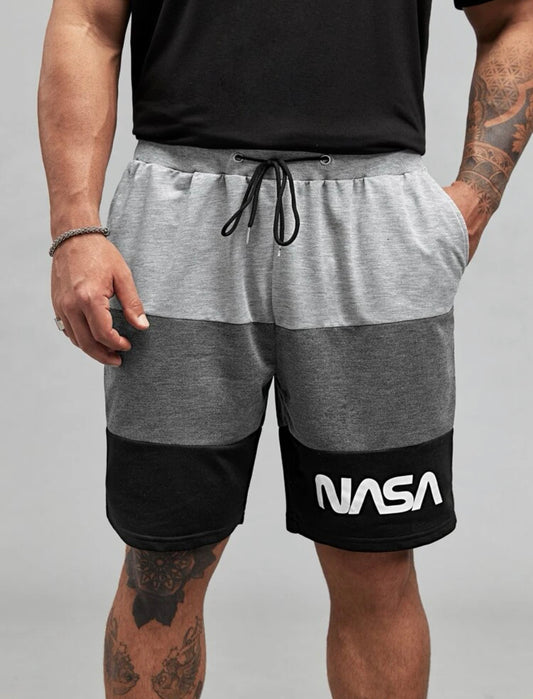 Men’s extended colorblock letter graphic grommet drawstring waist shorts