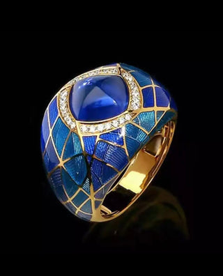 Blue stone decor gold plated and engraved statement ring. Size 8.