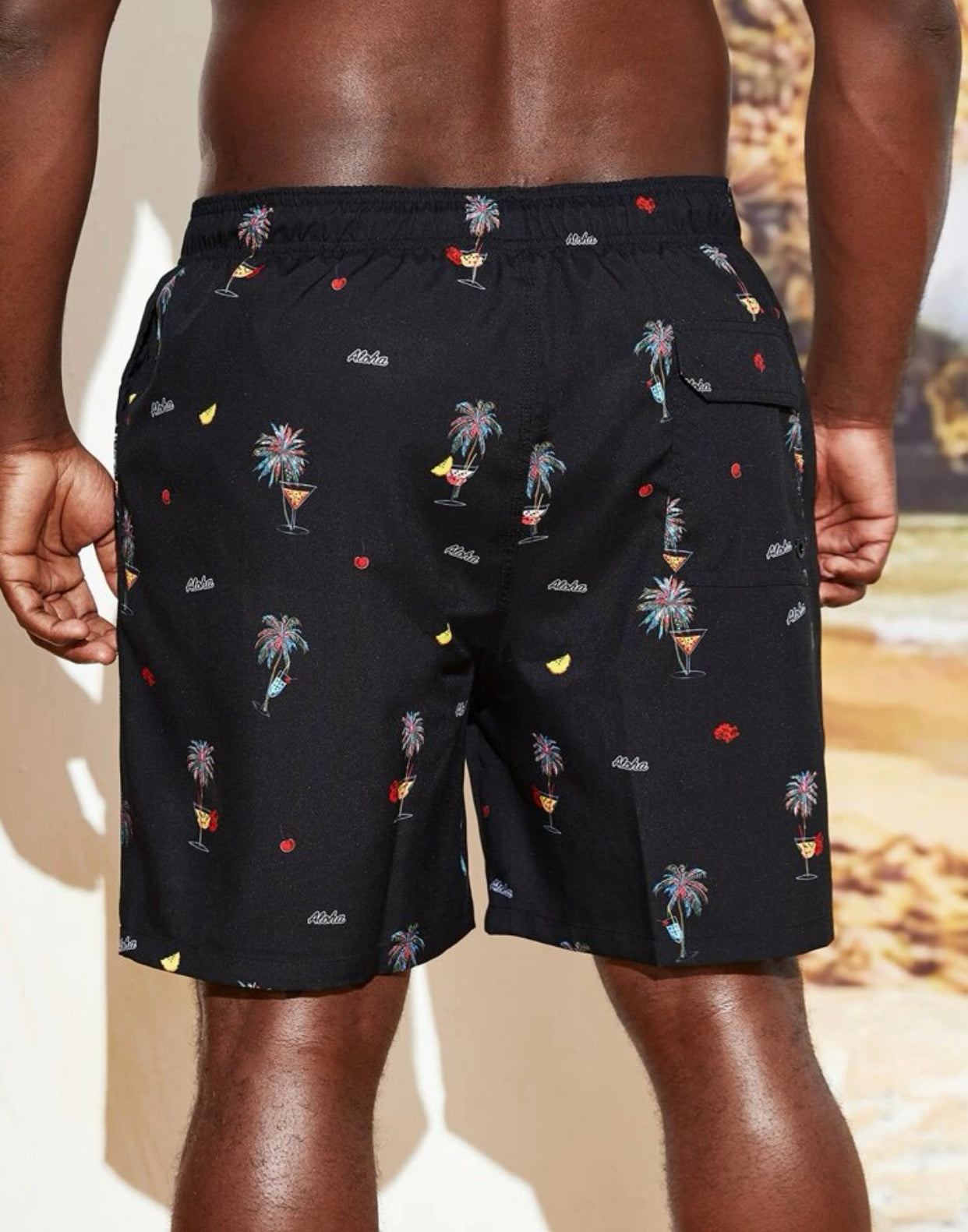Men’s extended size random print palm tree & letter graphic drawstring waist swim trunks
