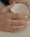 Turquoise gold coated oval decor ring. Size 8.