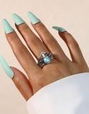 Tree design hollow out Larimar inspired ring. Size 8.