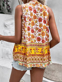 Floral print tie neck sleeveless blouse