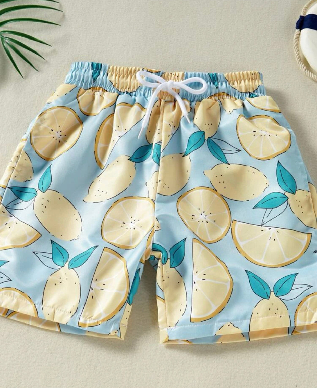 Toddler boys lemon print swim shorts