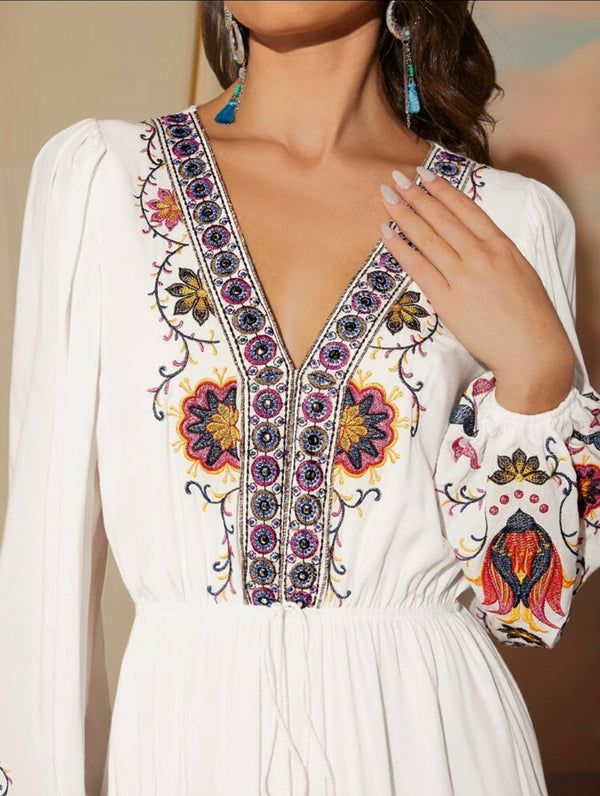 Floral embroidered lantern sleeve tassel tie front ruffle hem dress