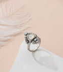 Rhinestone decor moonstone inspired statement ring. Size 8.