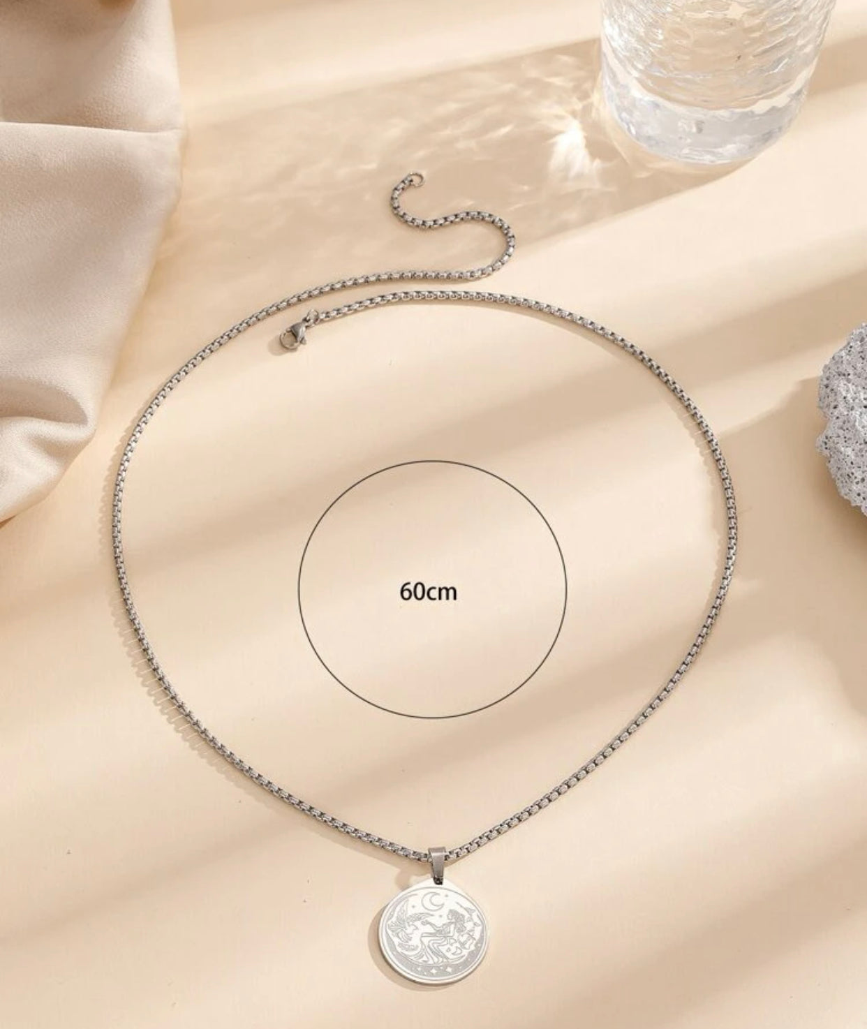 Figure graphic round charm necklace