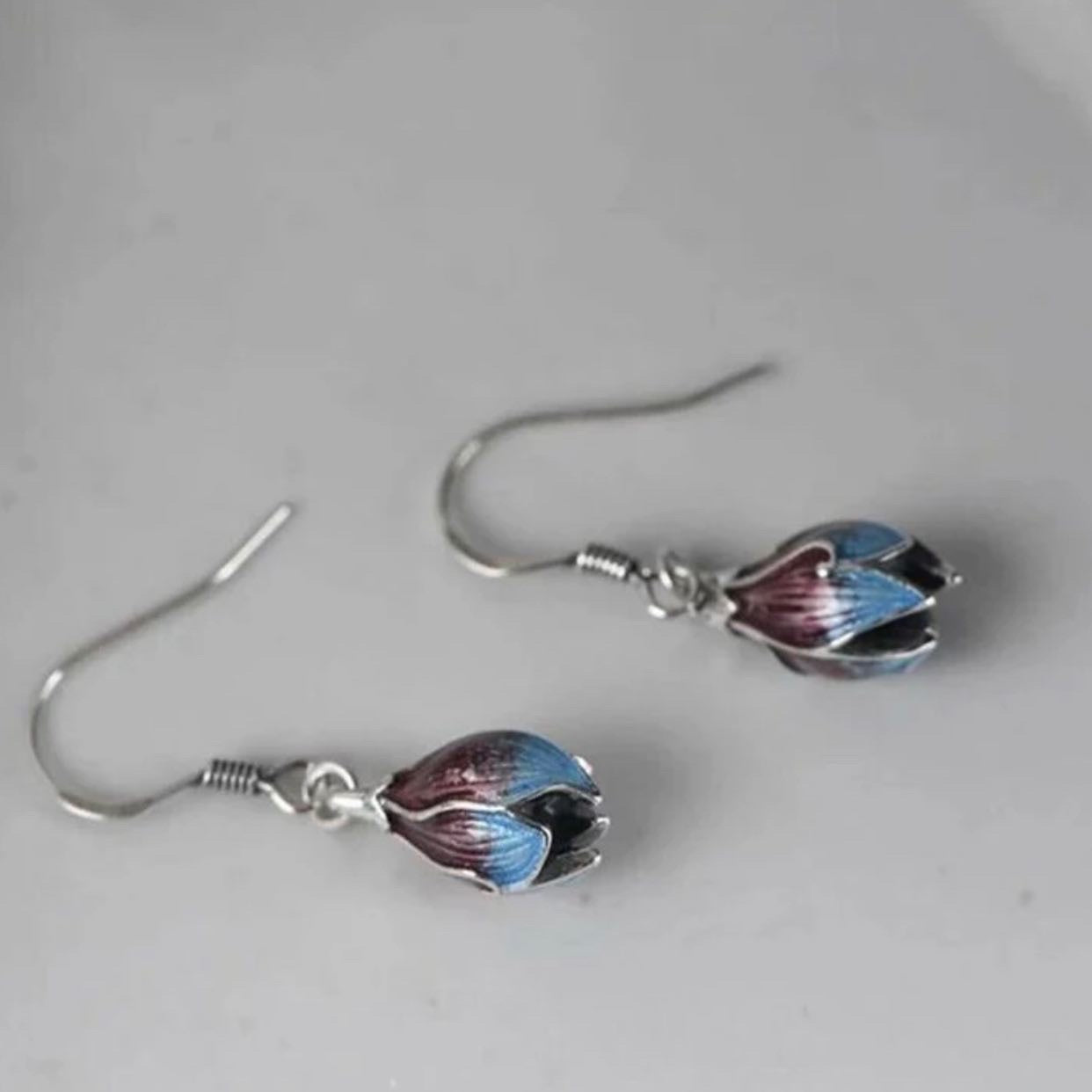Gradient blue and amber lotus flower dangle earrings