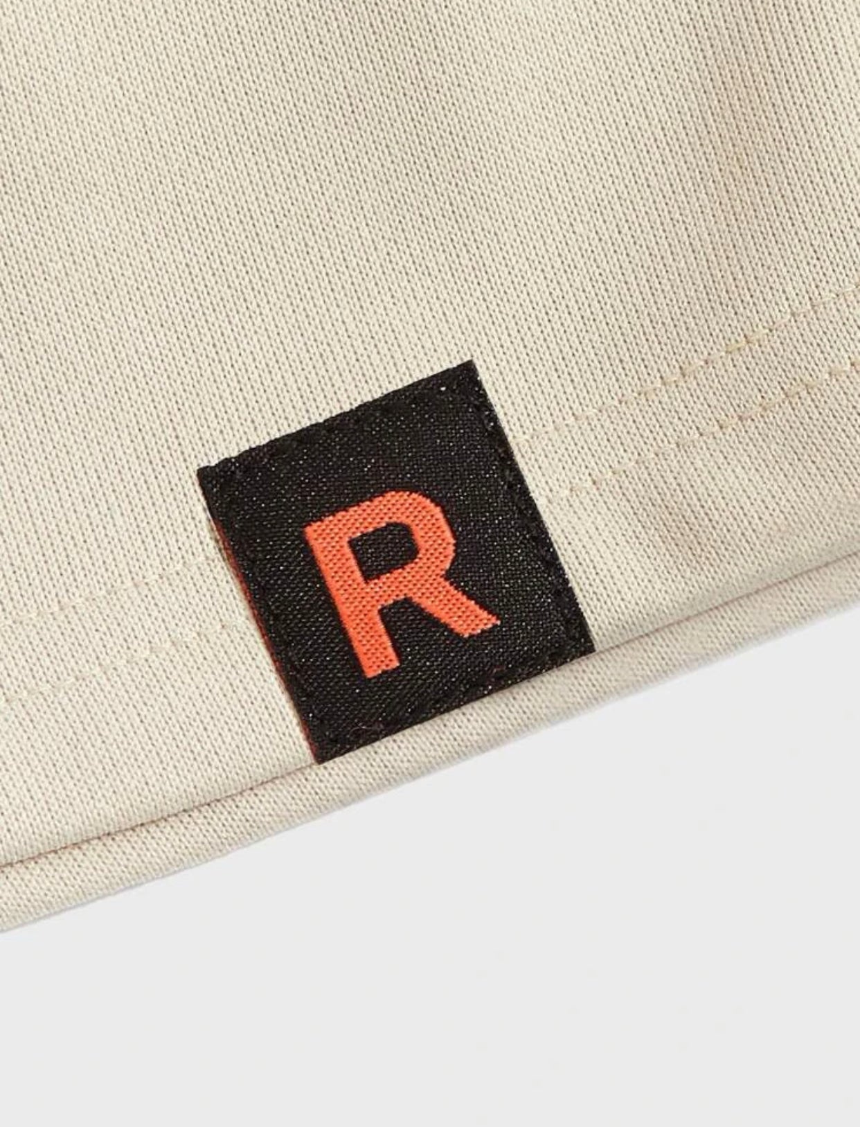 Letter patch detail drawstring waist shorts