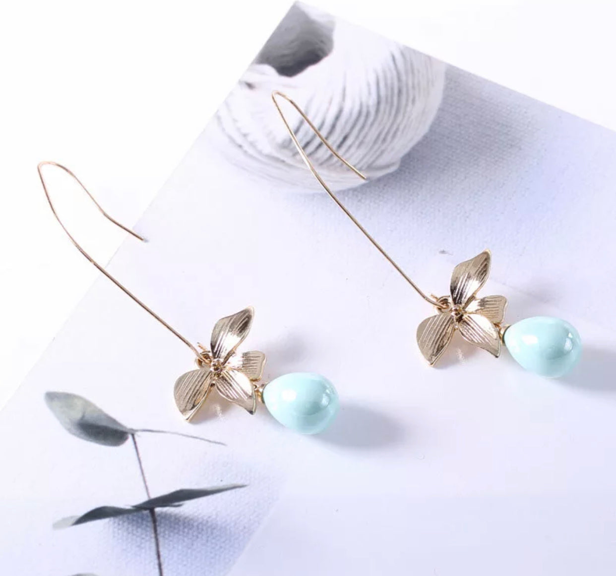 Delicate teardrop light blue stone trendy golden statement earrings