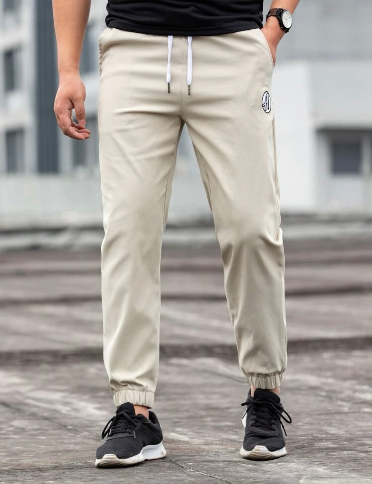 Men’s embroidered letter drawstring carrot pants