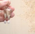 Neutral and abstract design triangular pearl dangle earrings