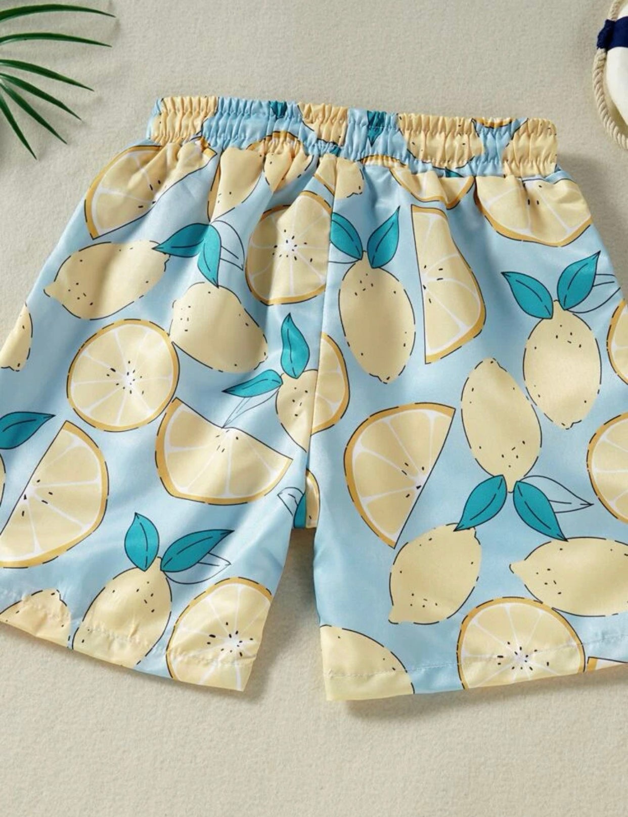 Toddler boys lemon print swim shorts