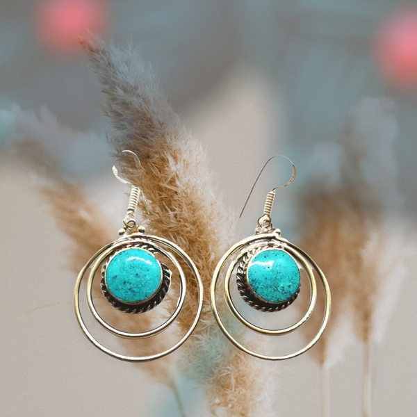 Turquoise and Tibetan silver dangle earrings.