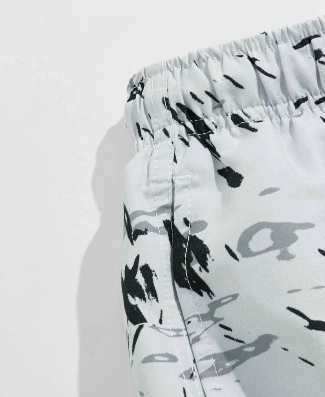 Men’s allover print drawstring waist swim trunks