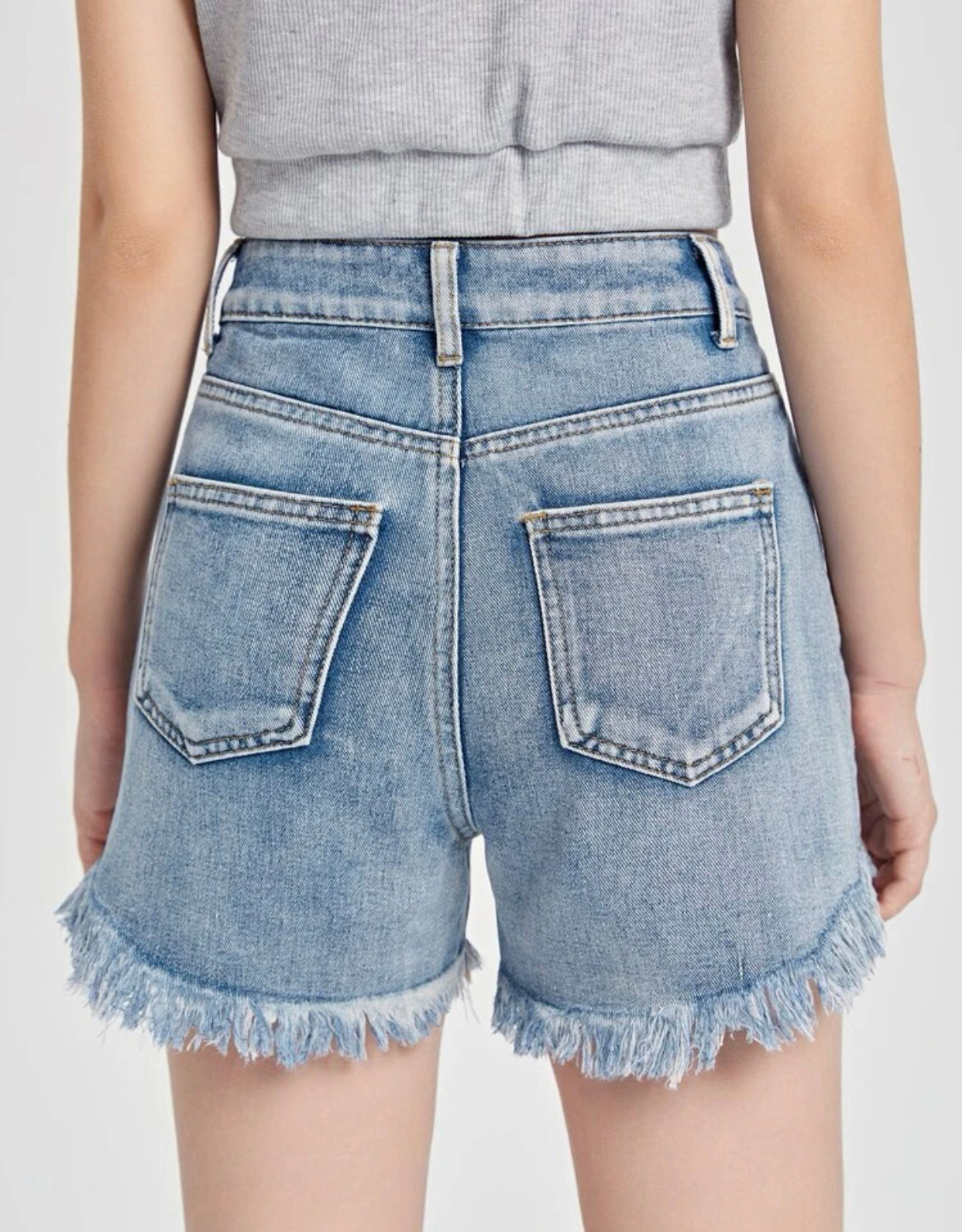 Teen girls ripped raw cut denim shorts