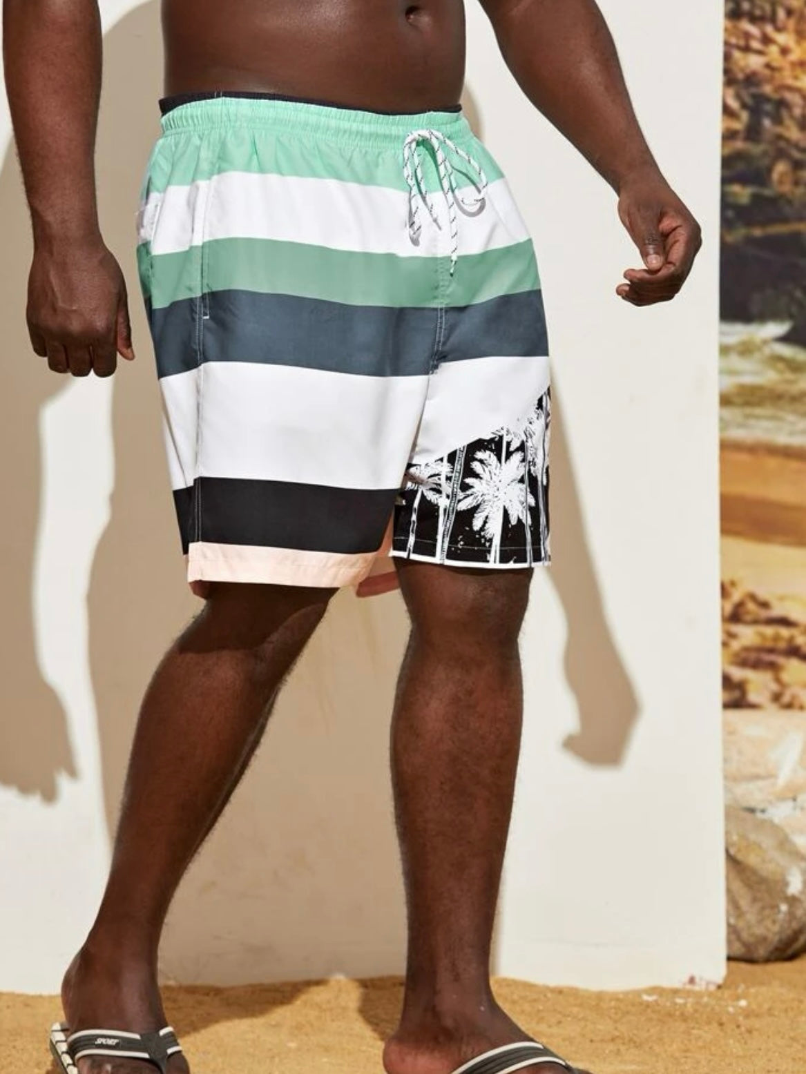 Extended sizes men coconut tree and figure graphic colorblock drawstring waist swim trunks