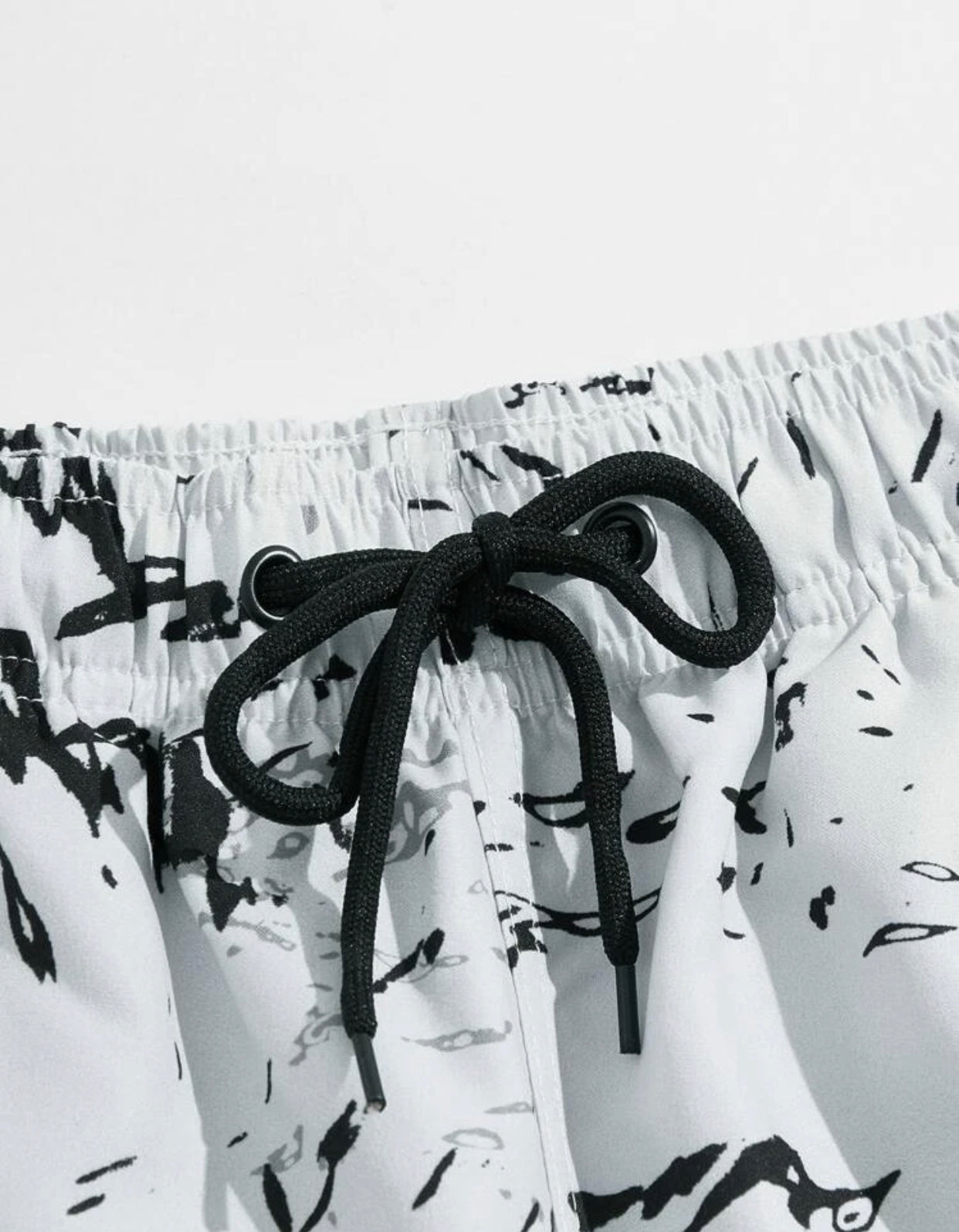 Men’s allover print drawstring waist swim trunks