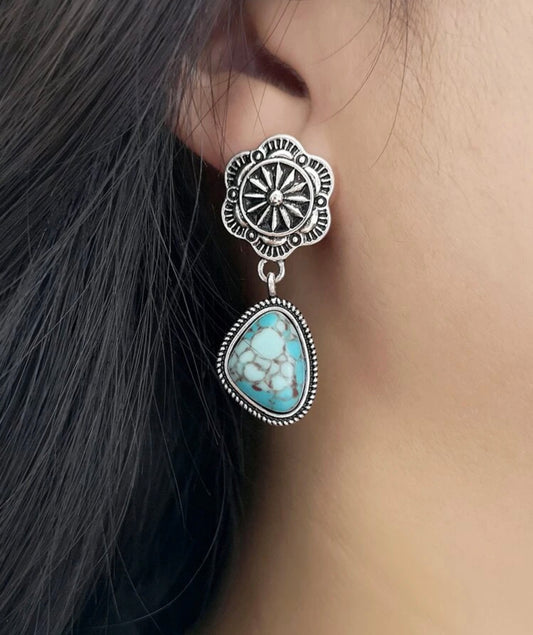 Lavish flower and stone decor drop earrings