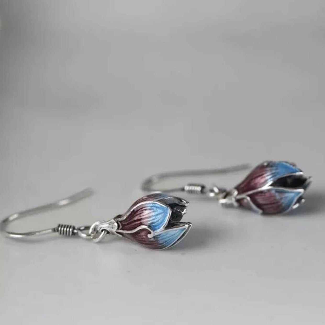 Gradient blue and amber lotus flower dangle earrings